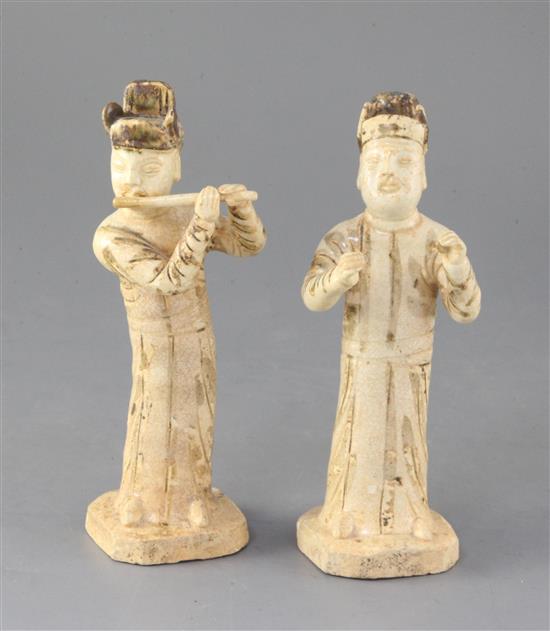 Two rare Chinese Qingbai standing figures of musicians, Song dynasty (11th/12th century), 9 and 8.5cm high, slight faults